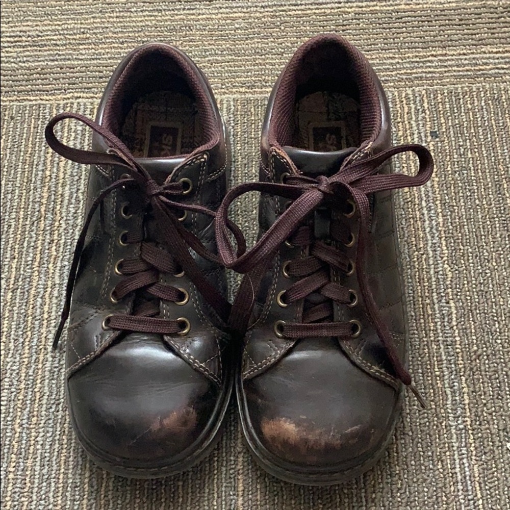 Brown leather sketchers.